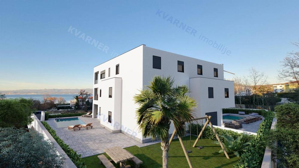Exclusive location-new building-apartment with garden and pool!