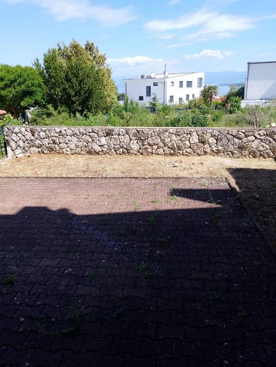 Erdgeschosswohnung mit Garten und Meerblick!