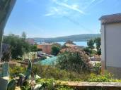 Ground-floor apartment with a garden and sea view!