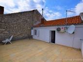 For sale!! Stone house for renovation in the center of Šilo with garage, large terrace and panoramic sea view!!